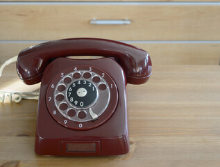 burgundy vintage traditional dial telephone
