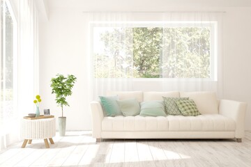 White living room with sofa and summer landscape in window. Scandinavian interior design. 3D illustration