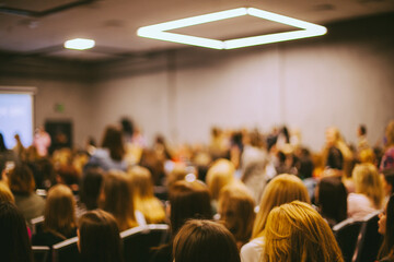 conference. people in the conference room. speech speaker in front of the audience. the audience in...
