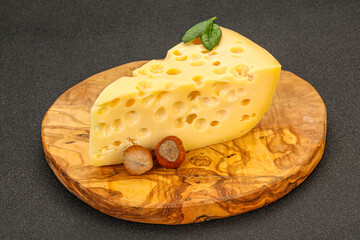 Maasdam cheese - yellow triangle with holes