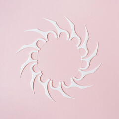 Round frame made of tooth flossers on pink background. Flat lay, top view minimal oral care, dental hygiene concept