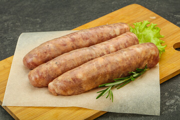 Raw pork meat sausages for grill