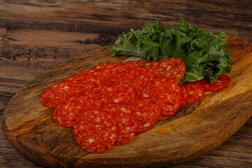 Italian spycy pepperoni sausage slices