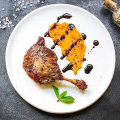 duck leg confit meat portion of prepared food Menu concept serving size. food background top view copy space organic 