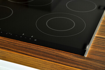 Modern kitchen and glass ceramic built-in electric oven detail