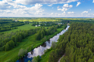 Fototapeta na wymiar The Teza river in the Shuisky district of the Ivanovo region on a summer day.