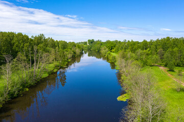 Fototapeta na wymiar The Teza River near the village of Krasnoarmeyskoye, Shuisky District, Ivanovo Region on a summer day.