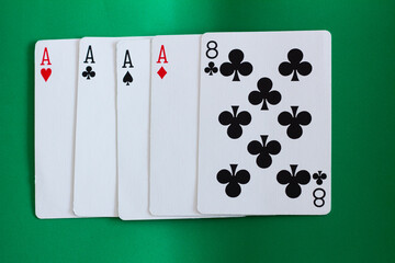 Poker Hand Casino Cards with green background