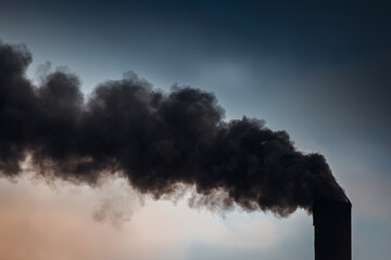 Factory air pollution, dark smoke close up