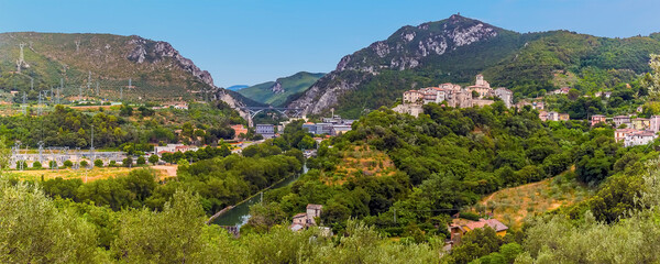 A panorama view looking up the River Neva at Papigno towards the Roman waterfalls at Marmore, Umbria, Italy in summer