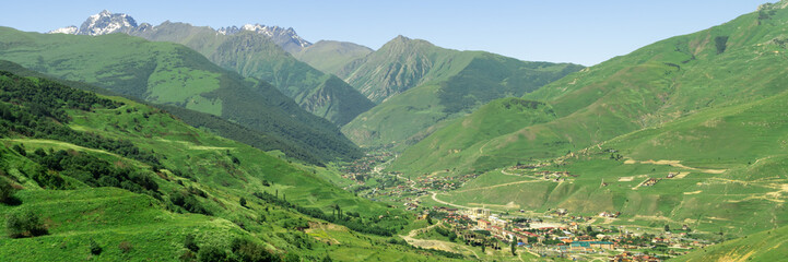 Fantastic view of highest mountain village in north ossetia in mountains with cloudy sky. Concept of travel the world