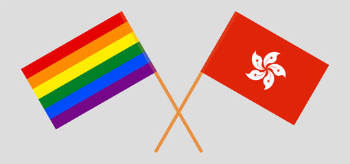 Crossed flags of LGBT and Hong Kong. Official colors. Correct proportion. Vector illustration
