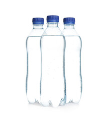 Plastic bottles with pure water on white background