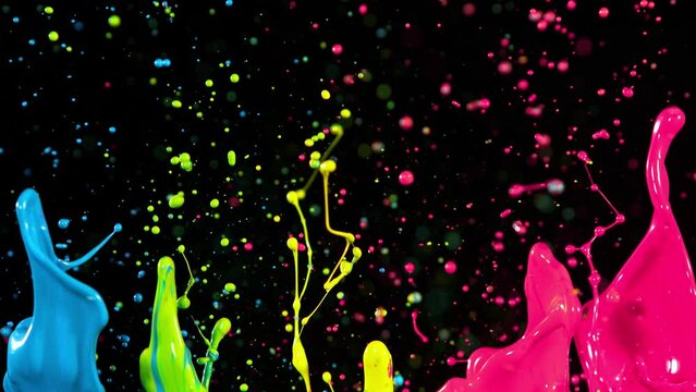 Colorful splashing paint in super slow motion. Shooted with high speed cinema camera at 1000fps