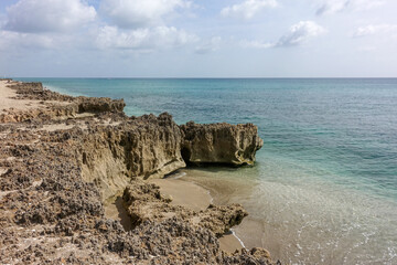 A rocky beach with clear turquoise water in Stuart, FL