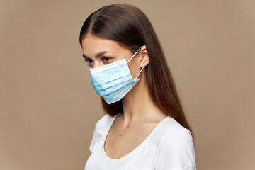 Model fashion clothes in a protective mask health 
