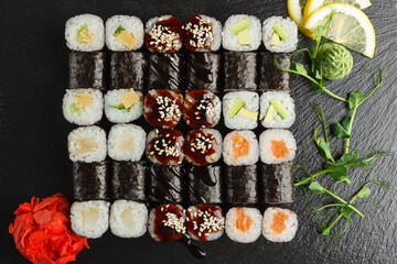 Japanese food: Set of salmon sushi and rolls with salmon and eel