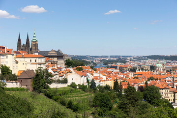 Prague City with gothic Castle and the green Nature from the Hill Petrin, Czech Republic