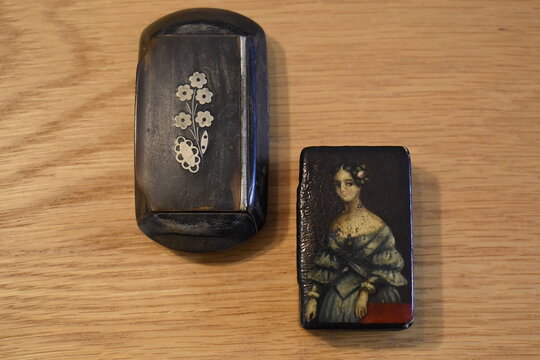 Ornate boxes produced in pocket size or larger communal for table use to keep the precious snuff dry. They hold amount of tobacco for immediate consumption and are intended to contain few days supply.