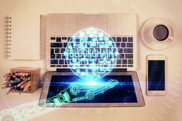 Blockchain theme hologram drawings over computer on the desktop background. Top view. Double exposure.