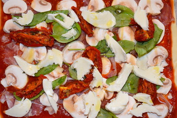 Authentic pizza with fresh high quality cheese. Classically in Naples toppings are simplistic and are representative of the tricolour Italian flag basil mozzarella and tomato sauce green white and red
