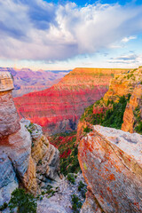 Panoramic image of the colorful Sunset on the Grand Canyon in Grand Canyon National Park from the south rim part,Arizona,USA, on a sunny cloudy day with blue or gloden sky