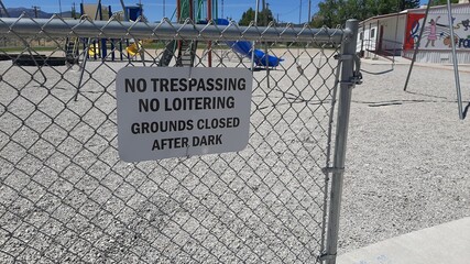 No Trespassing No Loitering Sign at Park Playground