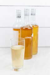 Homemade Elderberry Syrup in the bottles with copy space