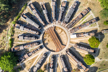 Antique steam locomotive, German made Old vintage  locomotives  lined up in circle. Aerial view drone shooting. Efes, Selcuk TURKEY