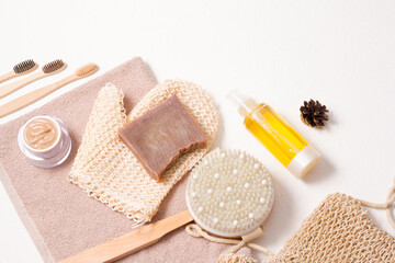 Obraz na płótnie Canvas eco friendly hygiene set on a white background, bath products made from natural materials for body care and oral cavity, zero waste lifestyle concept