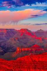 Panoramic image of the colorful Sunset on the Grand Canyon in Grand Canyon National Park from the south rim part,Arizona,USA, on a sunny cloudy day with blue or gloden sky