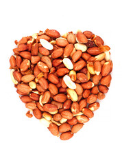 Organic unsalted Peanuts in heart symbol isolated on white background