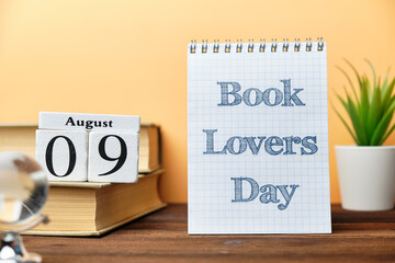 9th august - Book Lovers Day. Ninth day month calendar concept on wooden blocks