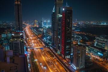 Fototapeta na wymiar Dubai downtown skyline at night from above, United Arab Emirates.