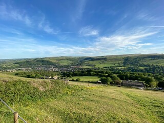 Looking across a Yorkshire valley on a sunny day, from high ground near, Haworth, Bradford, UK