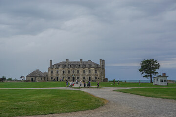 Fototapeta premium Porter, New York, USA: Visitors on the 23-acre grounds of Old Fort Niagara; the 18th-century 