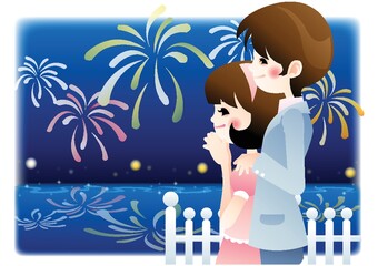 couple watching fireworks at seaside