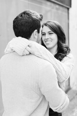 A happy young couple having a romantic moment in an urban setting in West Village in NYC