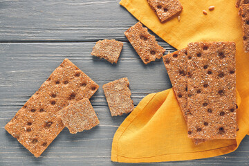Rye crispbreads on wooden table