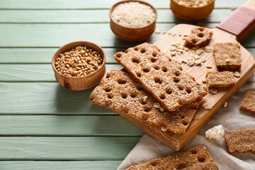Board with rye crispbreads on table