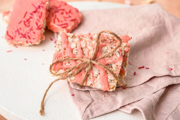 Board with crispy rice bars, closeup