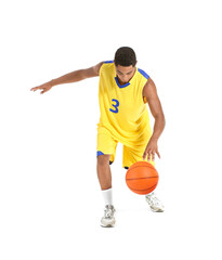 Young African-American basketball player on white background