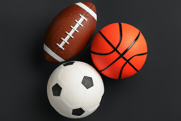 Sports balls on dark background