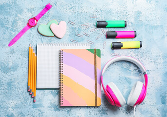 Composition with notebooks on color background