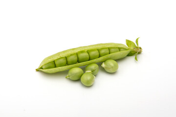 fresh green pea pod with seeds on a white background