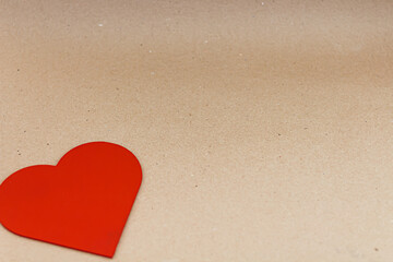 red heart on rustic background with space for advertisement