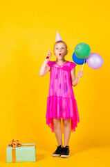 celebration. kid fashion beauty. imagination and inspiration. birthday party present. small girl with balloon. prepare for holiday. ready to celebrate. concept of dreaming. childhood happiness