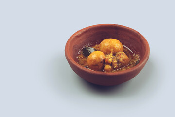 Indian home made Egg curry in pot	
