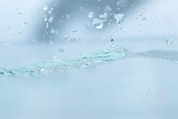 Naklejka na ściany i meble Splashing water bubbles, waves and drops isolated white background.