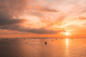 Fototapeta premium colorful dramatic sky with cloud at sunset on sea